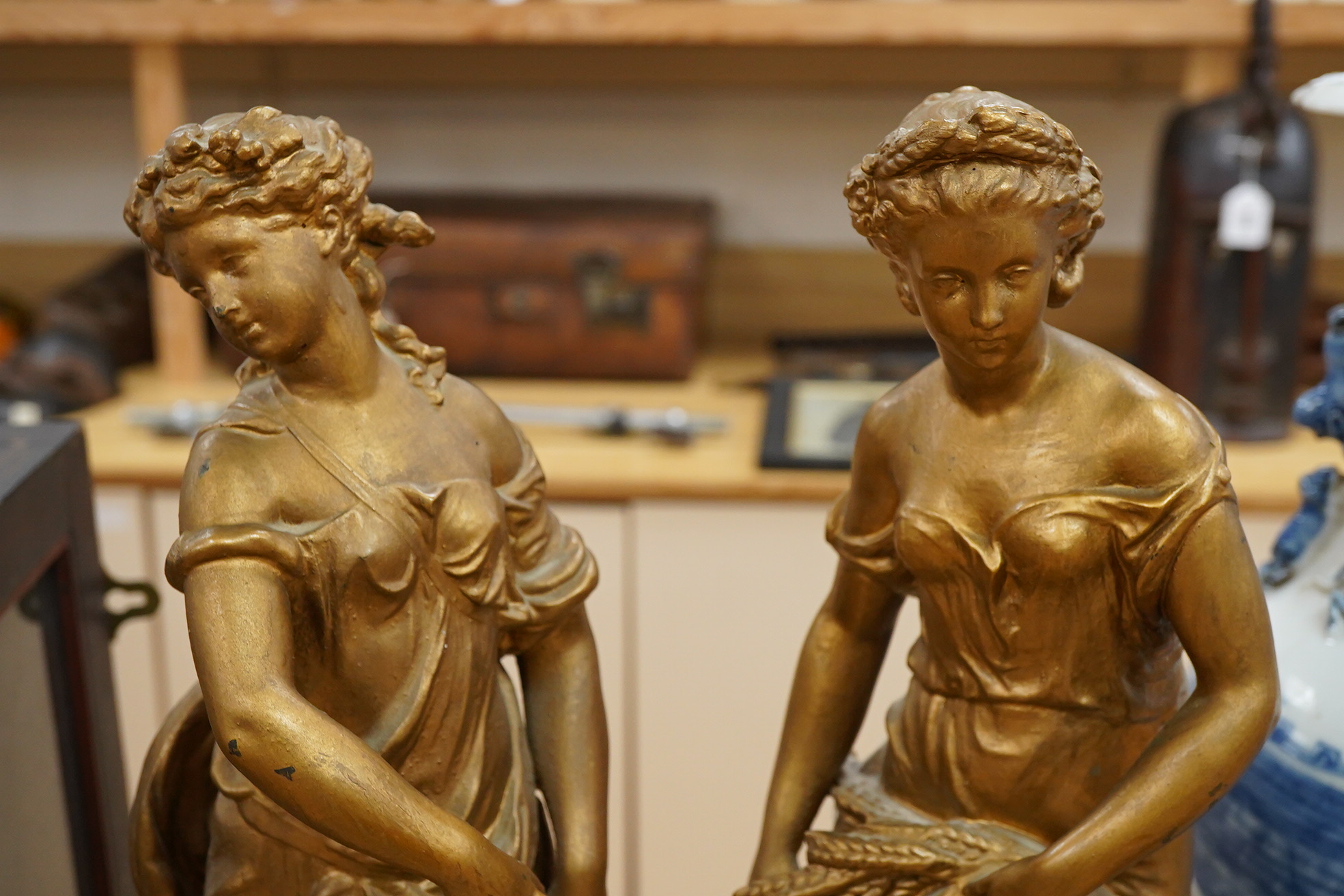 A pair of late 19th century gold-painted spelter figures, 48cm